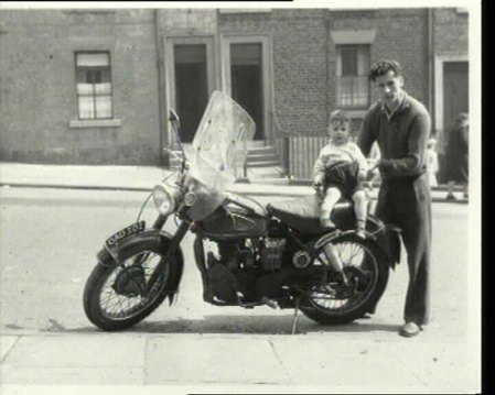 Jimmy Forsyth: Newcastle  11 / 13  A man with his son Photograph: Jimmy Forsyth/Tyne & Wear Archives